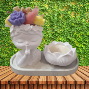 Set de bandeja con niña decorada con flores de vela aromática y cuenco flor de loto con vela